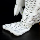 Detailed tail design of a white gyrfalcon stuffed animal, soft and realistic by SoftDaysLab