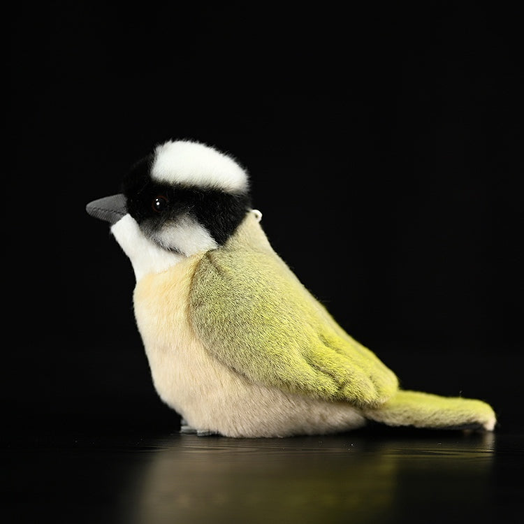 Side view of a realistic light-vented bulbul plush toy with soft texture and lifelike details