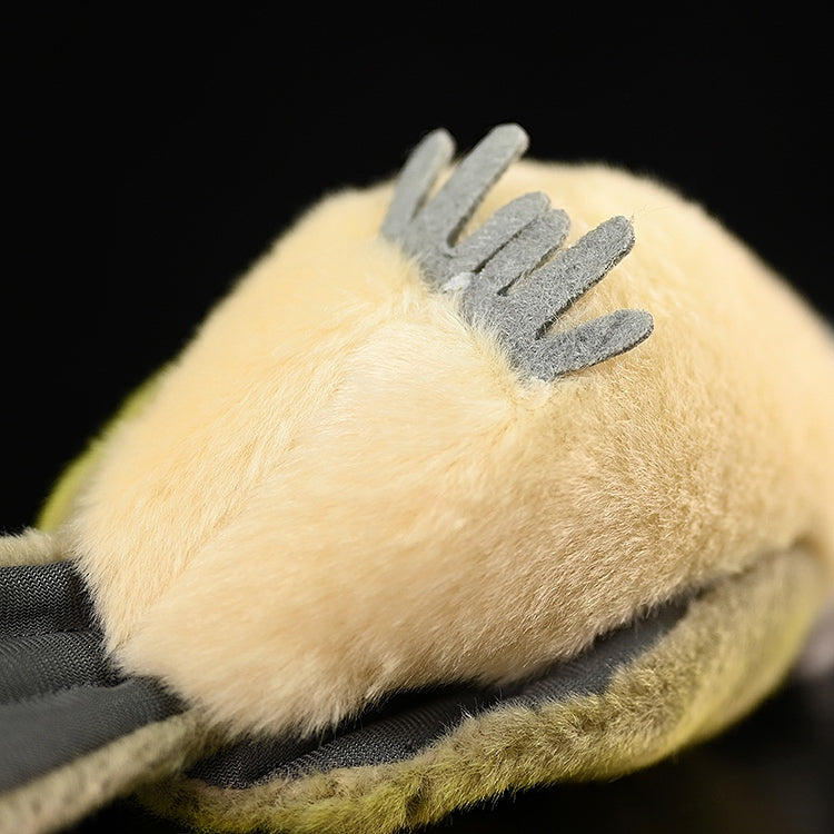 Detailed bottom view of the light-vented bulbul plush, showing its soft underside and crafted feet
