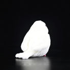 Back view of White Java Sparrow bird plush highlighting its tail and hanging loop for easy attachment