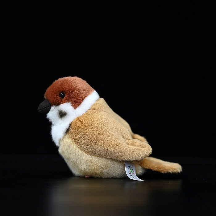 Side profile of a realistic Tree Sparrow bird plush toy with lifelike textures and stitched details