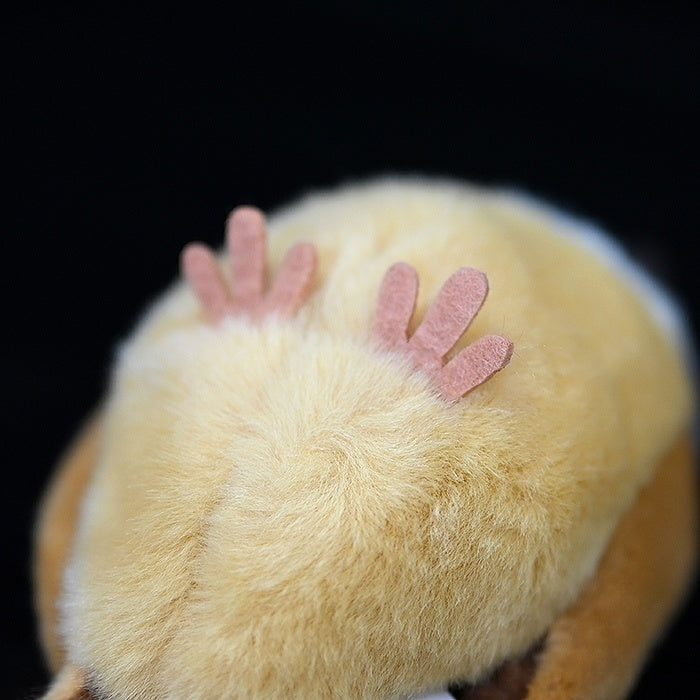 Bottom view of a Tree Sparrow plush toy displaying soft fabric feet and fluffy texture for added realism