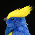 Profile view of Sultan Tit Plush Toy, showing its realistic black beak and lifelike plush features