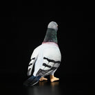 Back view of Hill Pigeon plush toy displaying detailed tail feathers and soft premium fabric