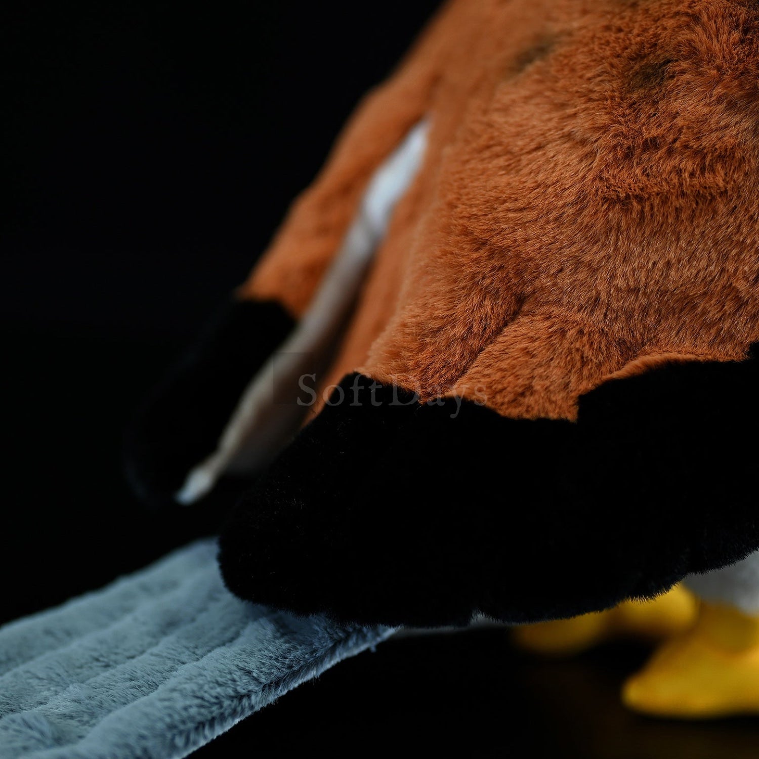 Close-up of the tail and wing details on the Eurasian Kestrel Plush Toy, showcasing its high-quality design