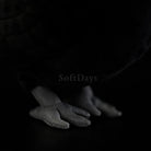 Close-up of the Eurasian Blackbird plush toy's gray feet with realistic stitching and soft texture
