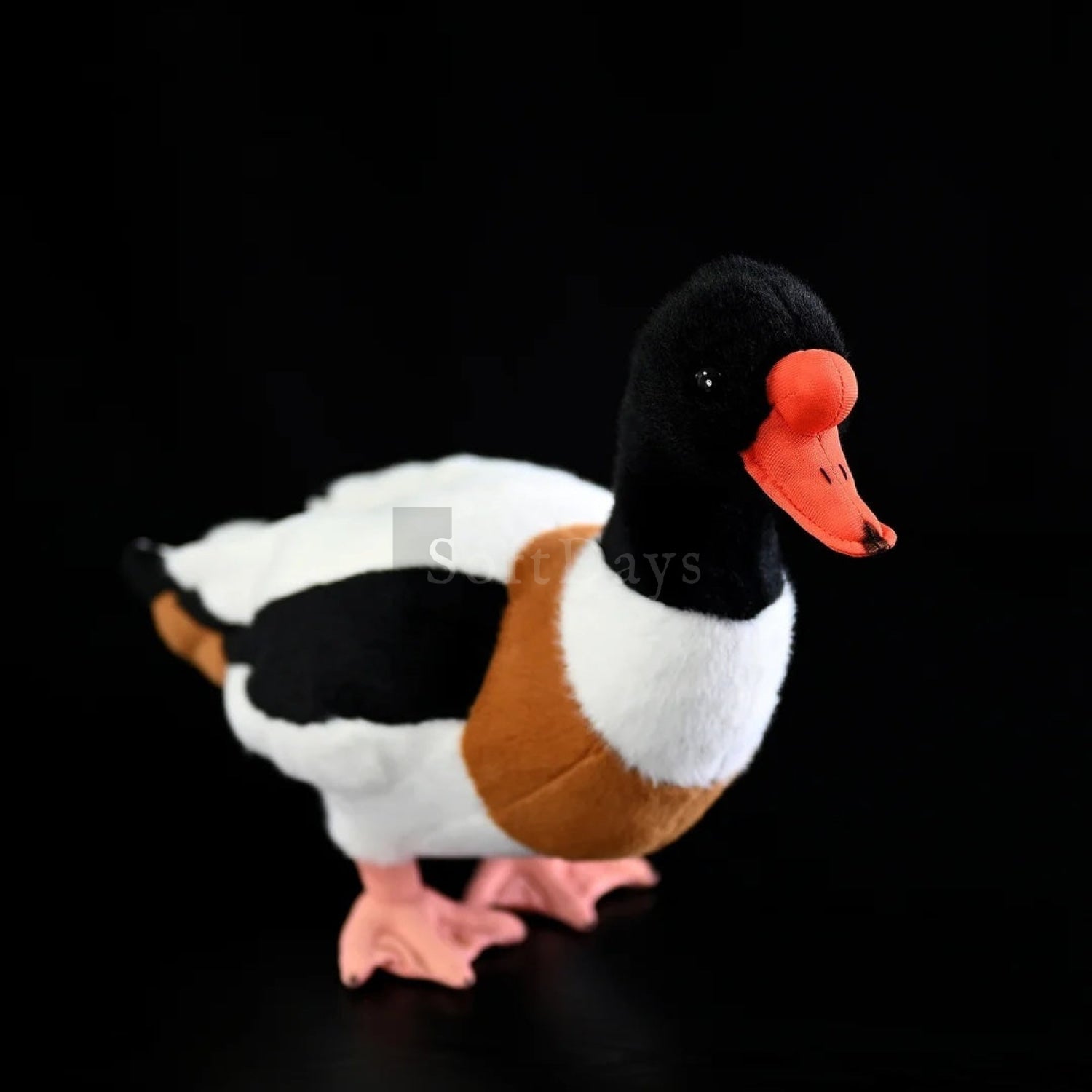 Adorable common shelduck plush toy with realistic orange beak and soft, cuddly black, white, and orange body