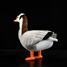 Rear-left angle of a Bar-headed Goose plush toy, showing realistic tail and wing details
