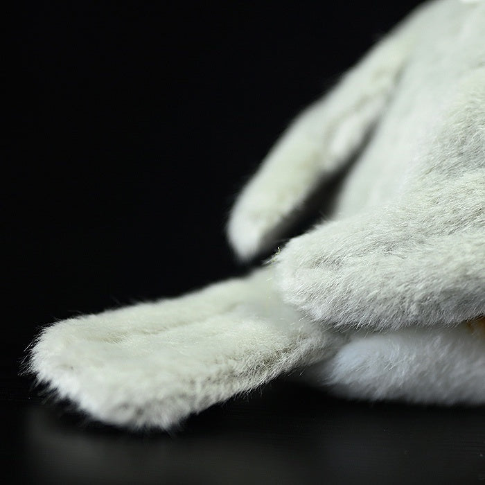 Close-up of Zebra Finch Plush Toy's tail, crafted with soft and realistic plush material