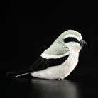 Side view of adorable Giant Grey Shrike Plush Toy, showcasing lifelike details and soft textures
