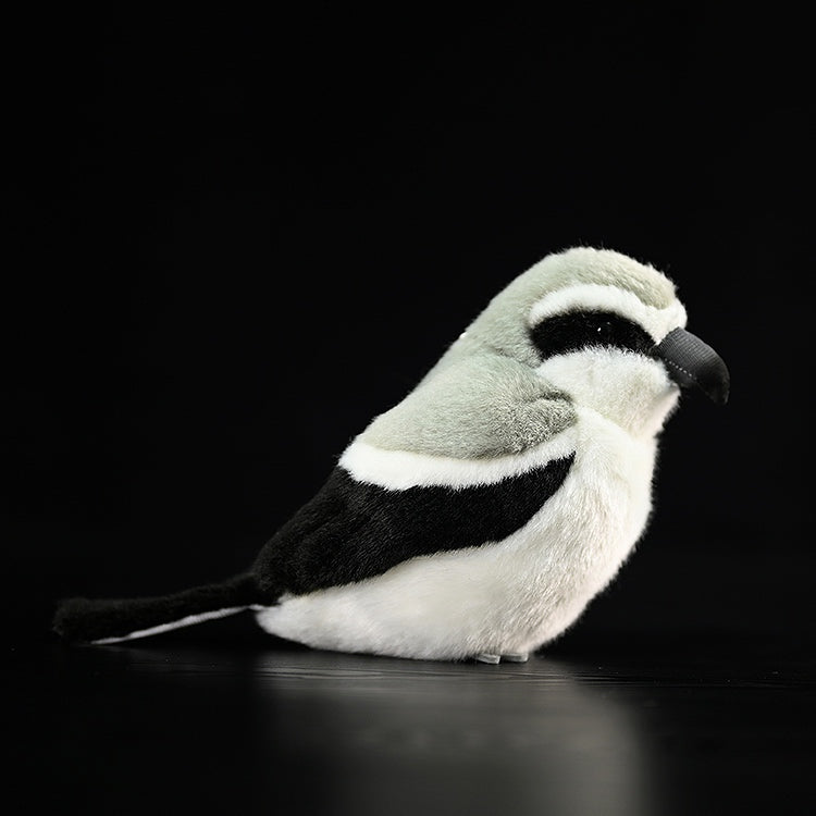 Side view of adorable Giant Grey Shrike Plush Toy, showcasing lifelike details and soft textures