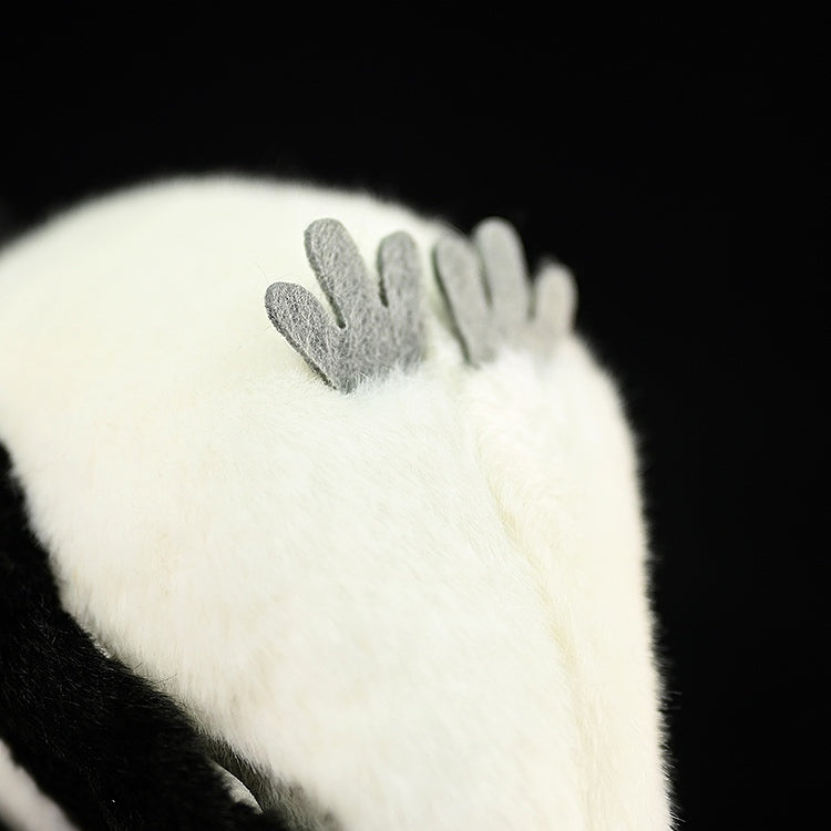 Close-up of Giant Grey Shrike Plush Toy's feet, featuring soft and adorable design elements for collectors