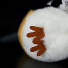 Bottom view of Eurasian Hoopoe Plush Toy's feet, featuring soft and durable materials for collectors
