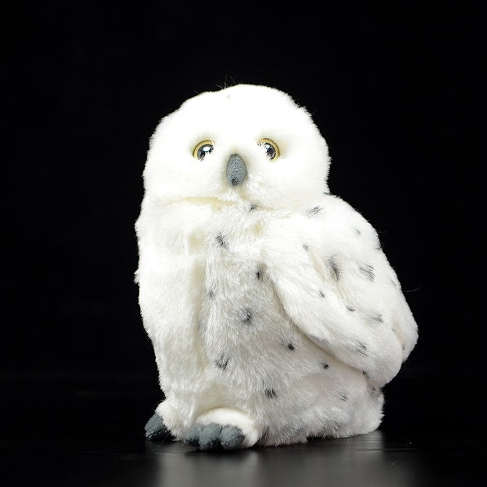 Realistic snowy owl plush toy with soft white fur and black markings, perfect for bird lovers and collectors