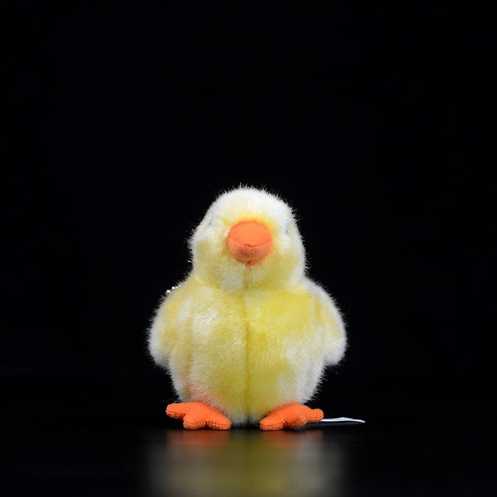 Front view of a cute yellow chick stuffed toy with realistic design, ideal for kids and collectors