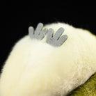 Detailed view of the Warbling White-Eye plush toy’s feet, showcasing its intricate and adorable craftsmanship