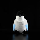 Sitting azure-winged magpie stuffed toy with soft blue wings and plush texture
