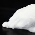 Close-up of the plush egret's soft white feathers, designed to mimic real Great White Egret plumage
