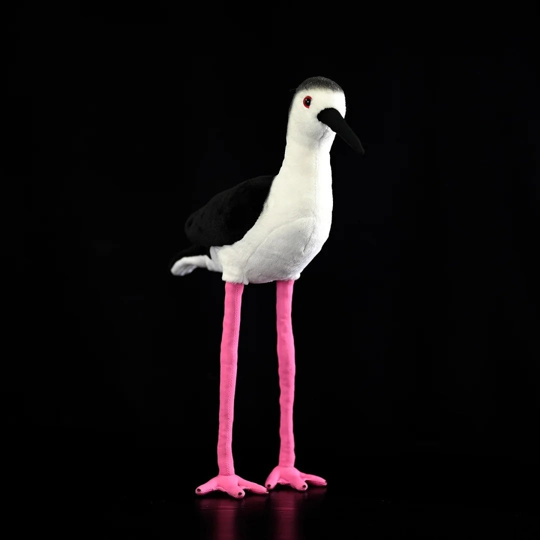 Realistic Black-winged Stilt plush toy by SoftDaysLab, with soft black and white fur and pink legs