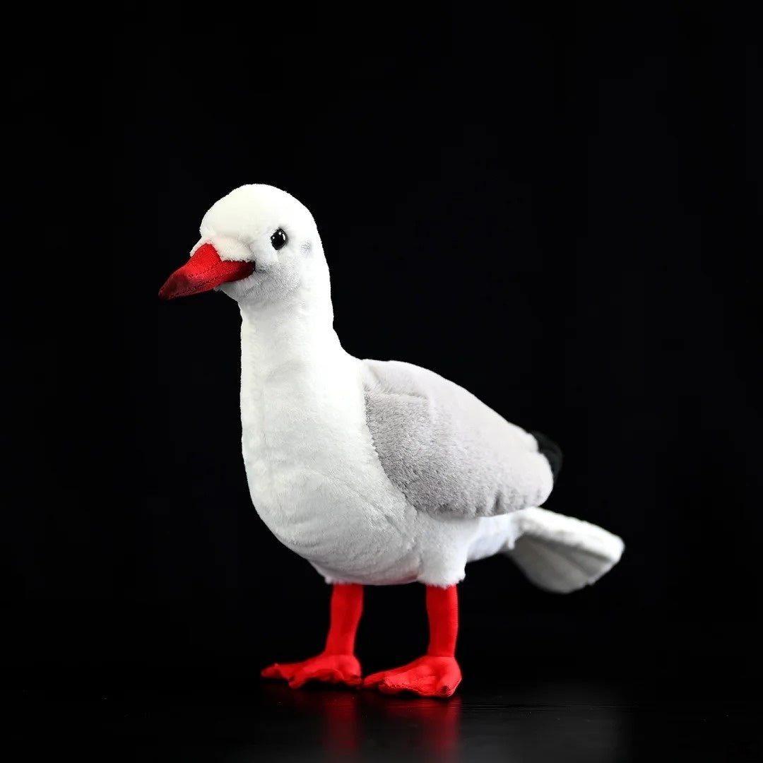 Side profile of a soft Black-headed Gull plush with gray wings, red beak, and realistic design