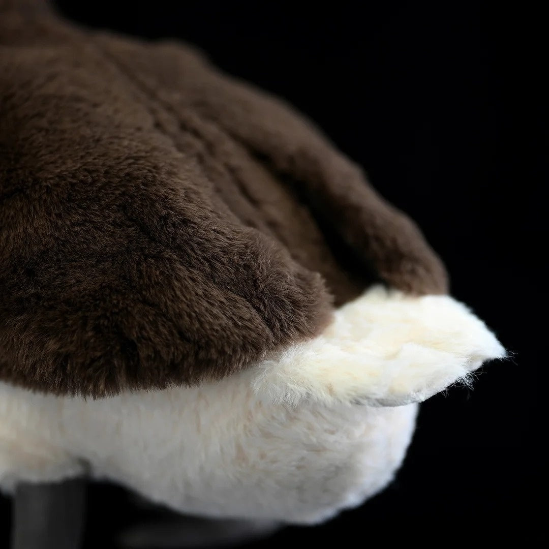 Detailed close-up of Little Grebe plush's soft and fluffy tail, crafted for a lifelike appearance