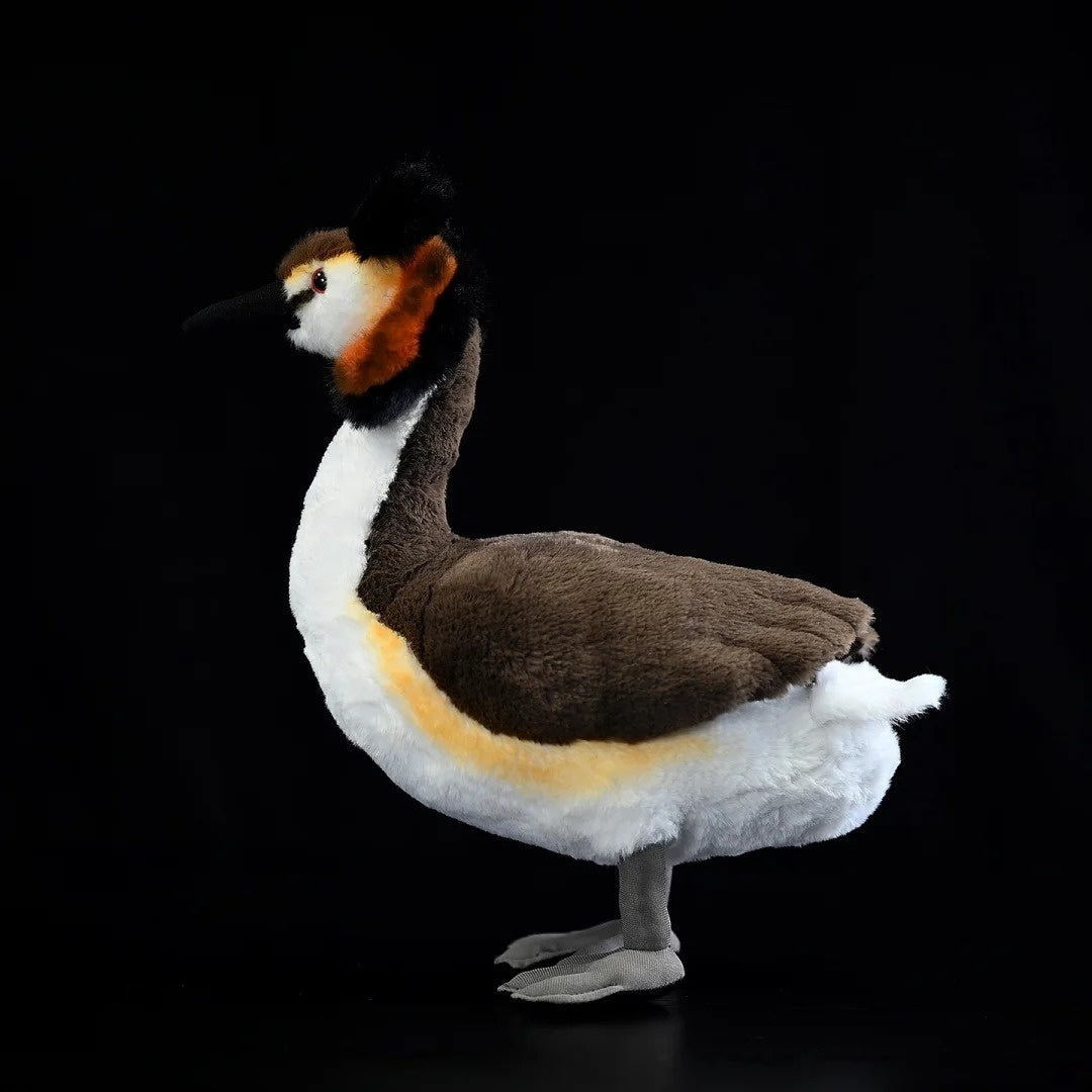 Side profile of Great Crested Grebe plush toy highlighting detailed plumage and realistic design