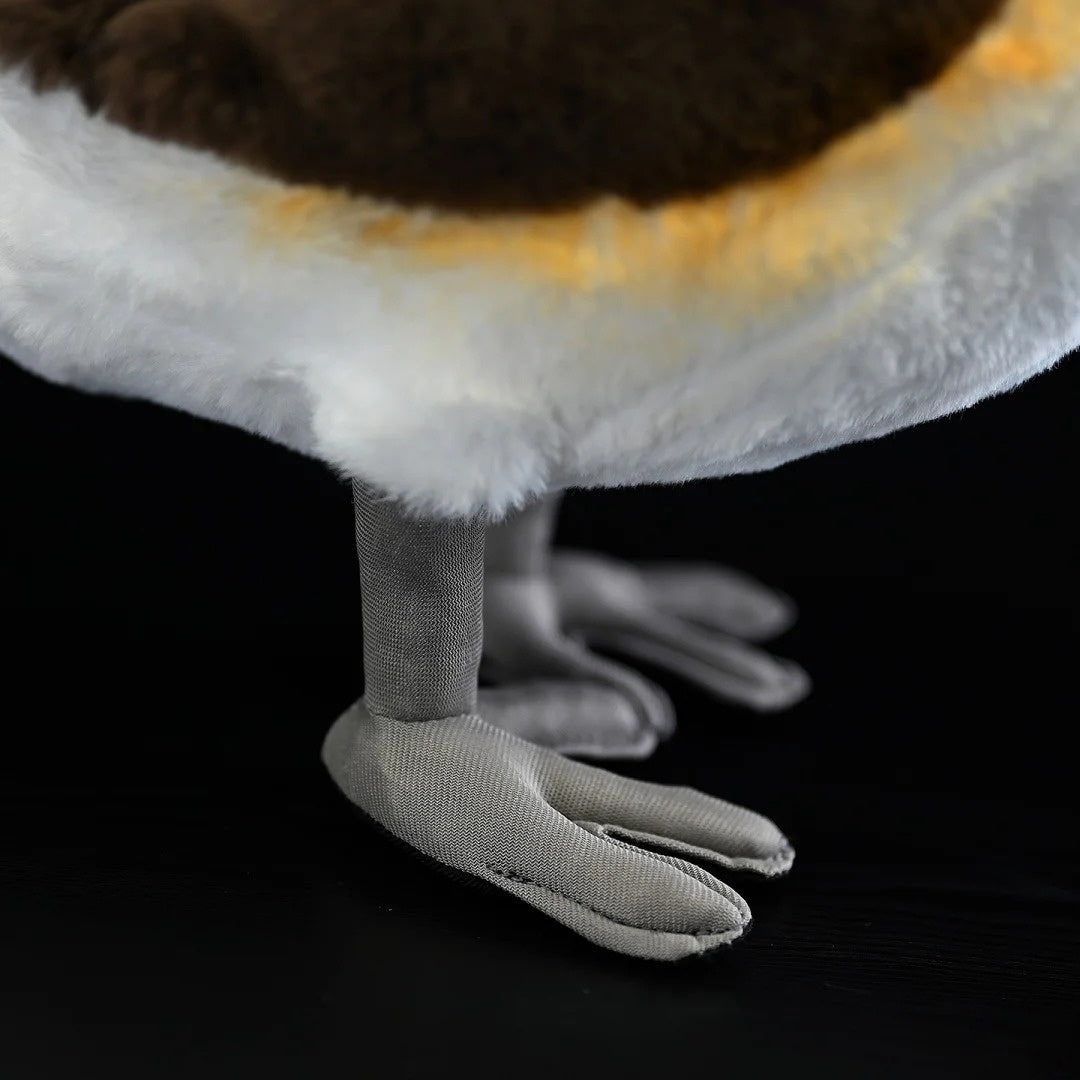 Close-up of Great Crested Grebe plush's webbed feet, designed with fine details for lifelike accuracy