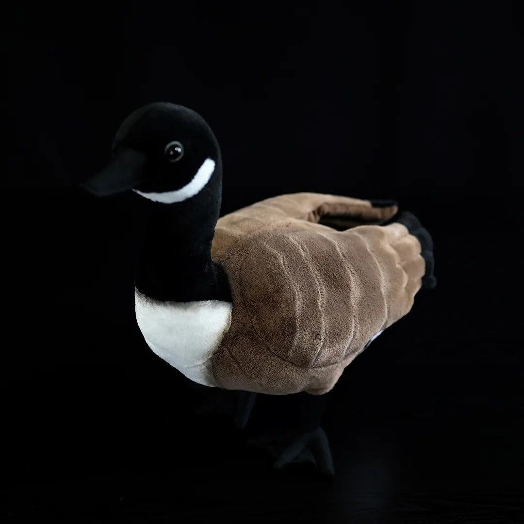 Canada Goose stuffed animal in a relaxed pose, perfect for bird lovers and collectors