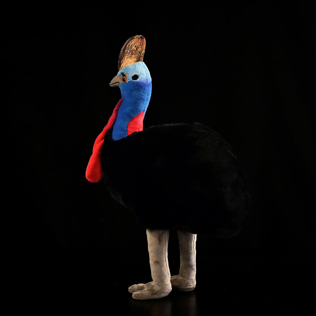 Back view of a Southern Cassowary plush toy showing its realistic casque and red wattles