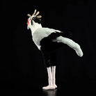 Side view of a lifelike Secretarybird plush toy featuring long legs and vivid colors for nature enthusiasts