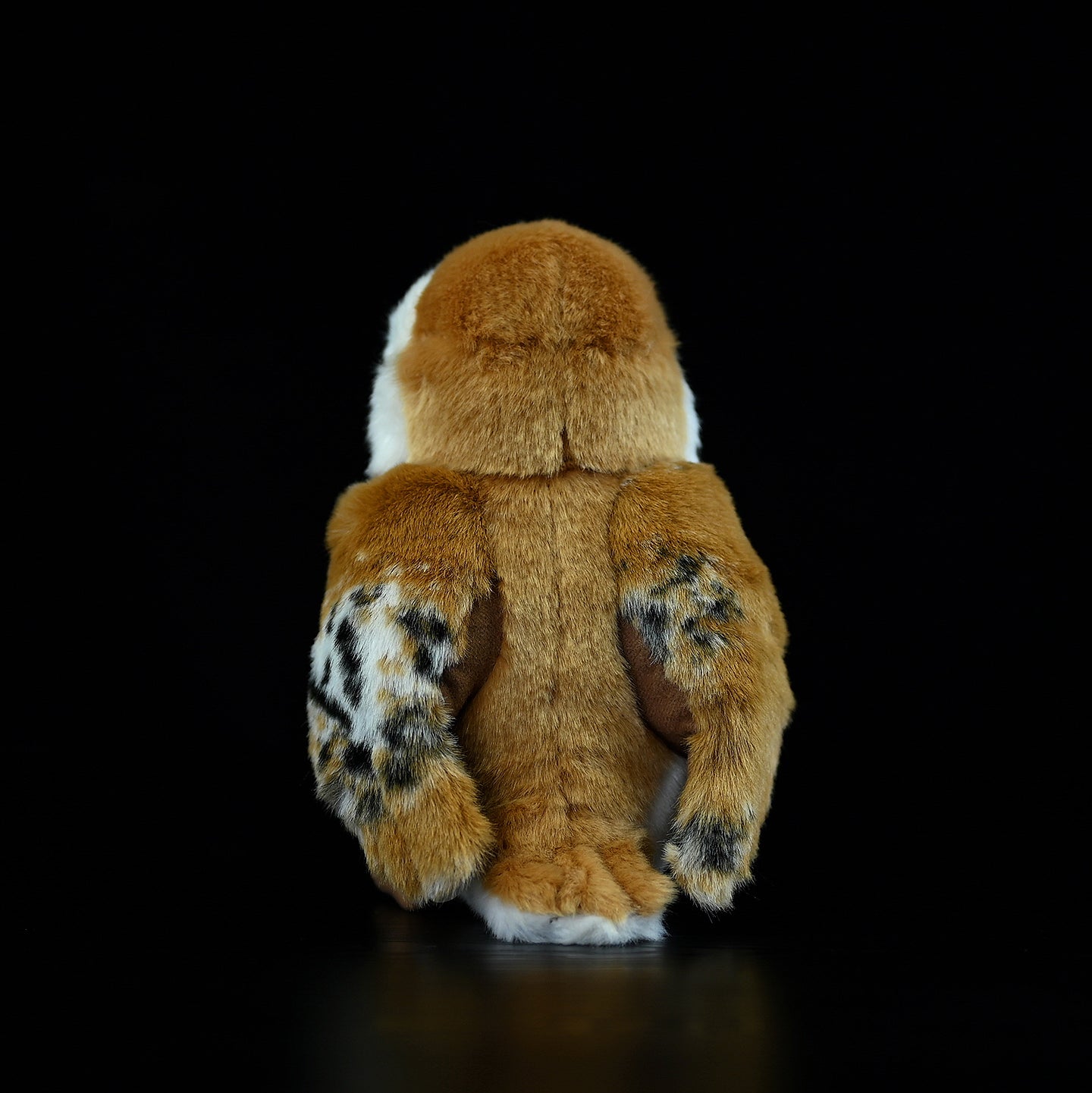Rear view of the Barn Owl Plush Toy showcasing its beautifully patterned wings and realistic textures