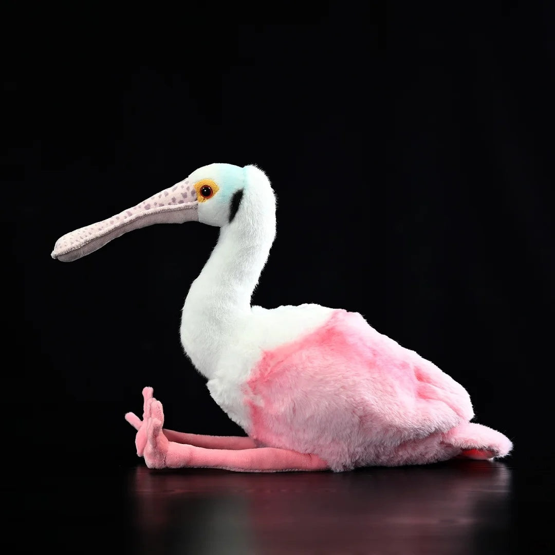 Side profile of Roseate Spoonbill Plush Toy, highlighting its realistic coloration and detailed textures