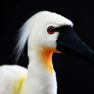 Zoomed-in shot of the plush's head, highlighting vivid red eyes and realistic feather textures by SoftDaysLab