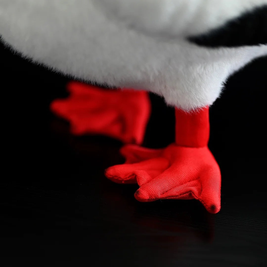 Vibrant red feet of the Red-footed Booby plush toy, expertly crafted for realistic bird detail enthusiasts