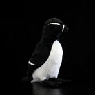 Angled view of the lifelike Razorbill plush by SoftDaysLab®, featuring detailed seabird-inspired features
