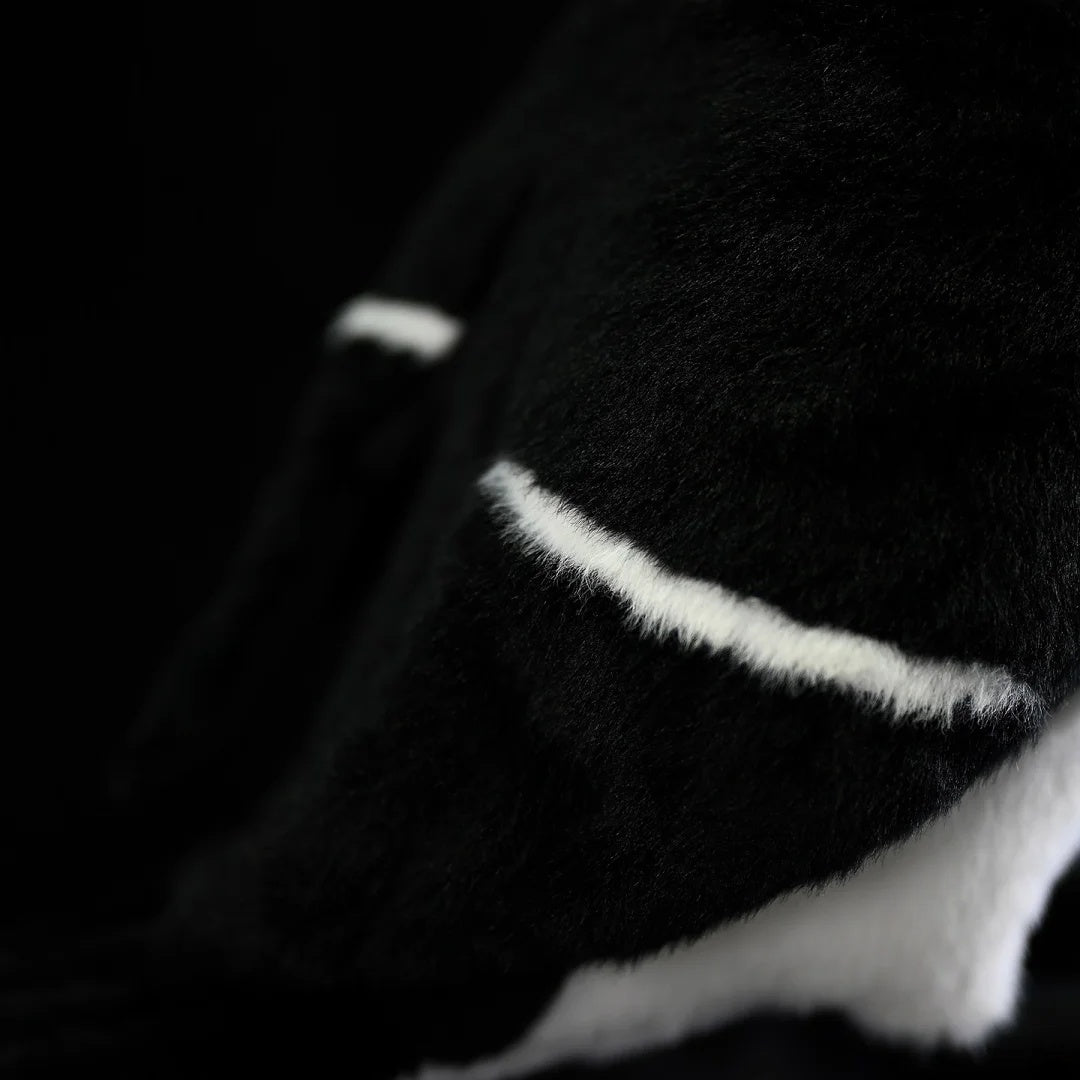 Feather detail on the Razorbill plush by SoftDaysLab®, inspired by the bird's classic wing markings