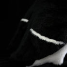 Feather detail on the Razorbill plush by SoftDaysLab®, inspired by the bird's classic wing markings