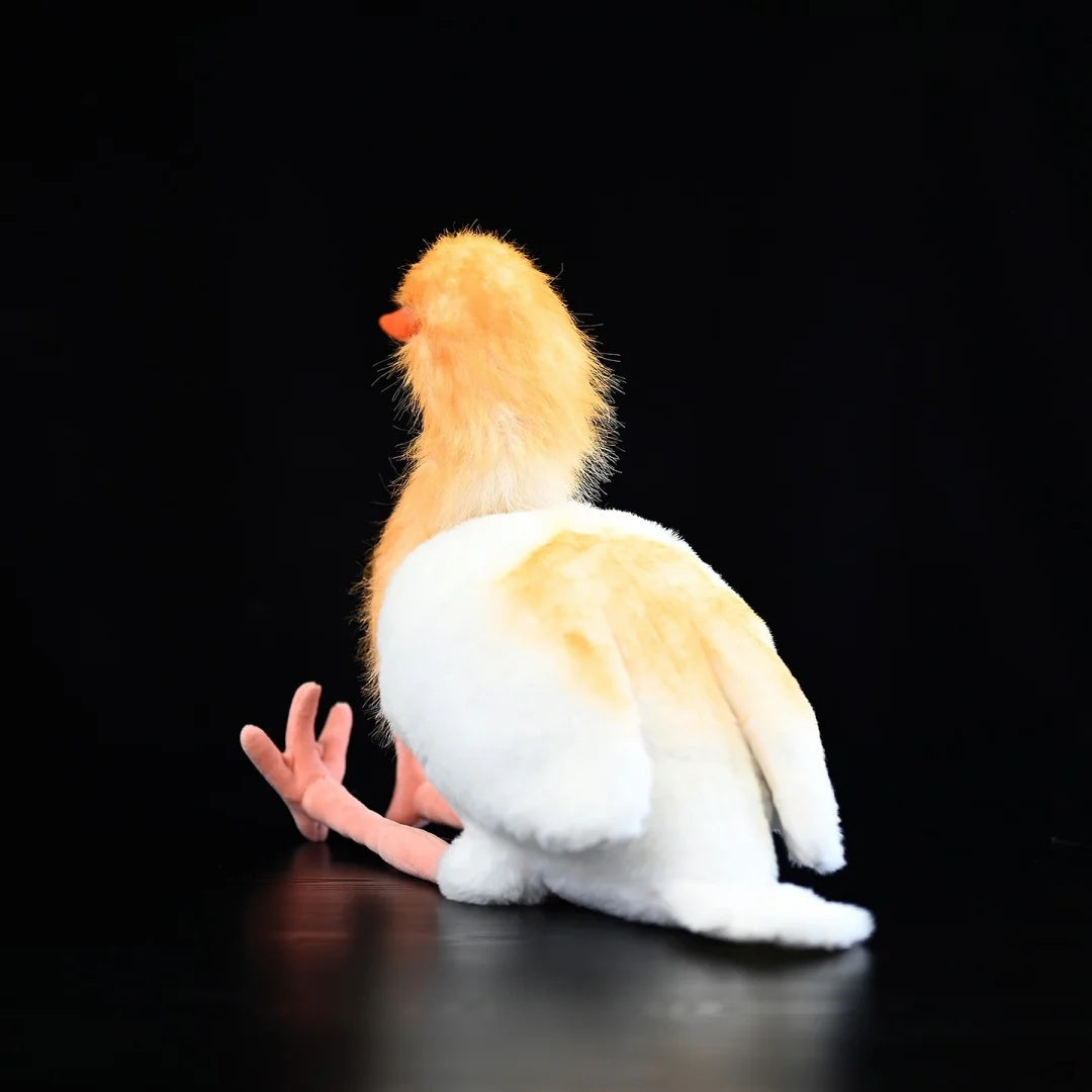 Vista trasera del peluche de garceta bueyera oriental de SoftDaysLab®, que destaca el diseño suave y realista de sus alas y cola.