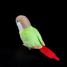 Angled back view of Pineapple Green-cheeked Conure plush by SoftDaysLab®, featuring vibrant tail feathers
