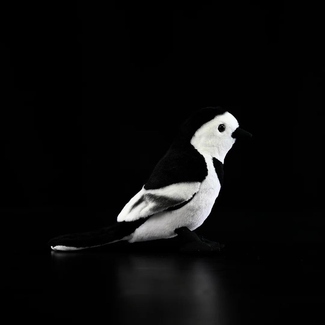 Profile view of the White Wagtail stuffed animal by SoftDaysLab®, capturing its elegant and natural posture