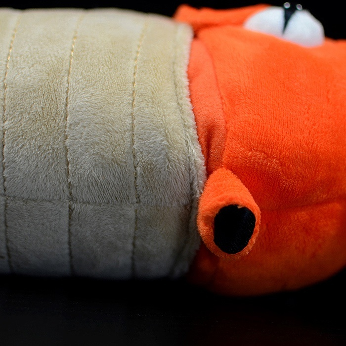 Detailed view of Orthoceras plush toy's shell texture, with soft and stitched ridges for realism
