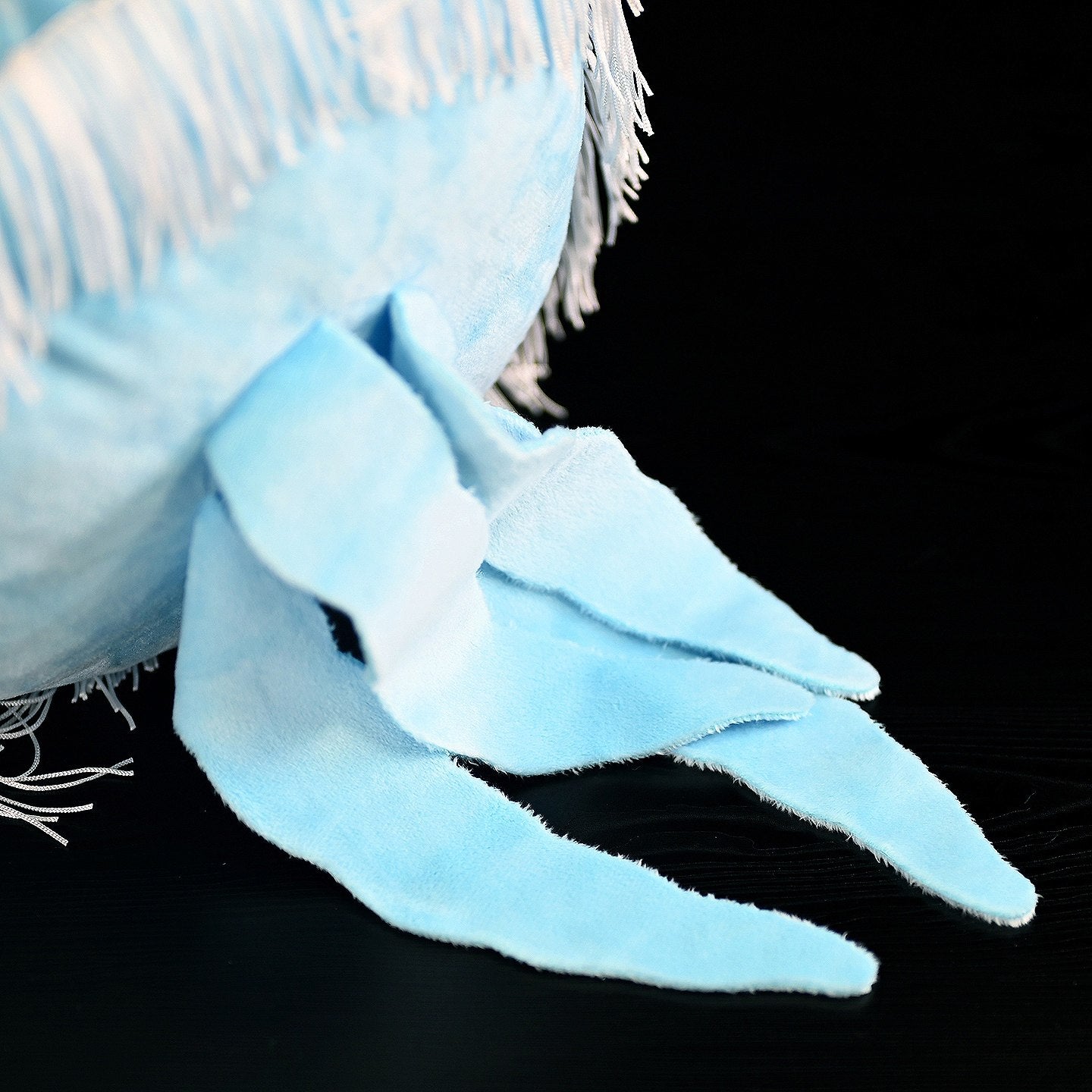 Close-up of the soft, flowing tentacles on the Moon Jellyfish Plush, highlighting its realistic design