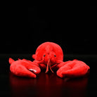 Front view of American lobster plush toy showing detailed claws and lifelike design