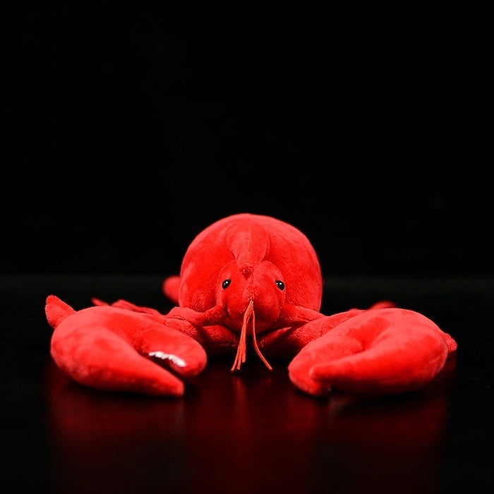 Front view of American lobster plush toy showing detailed claws and lifelike design