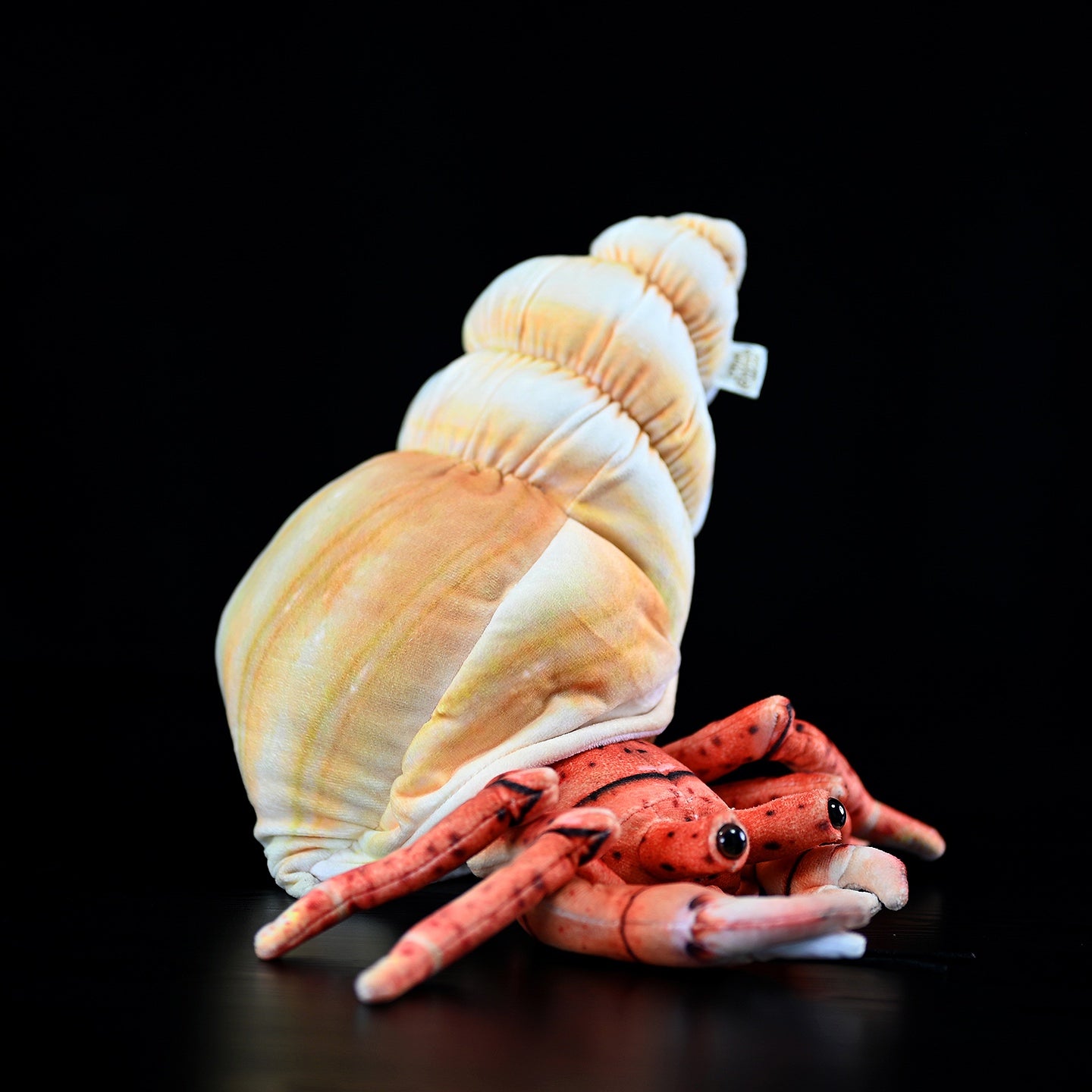 Soft hermit crab plush showcasing lifelike details and a beautifully crafted shell