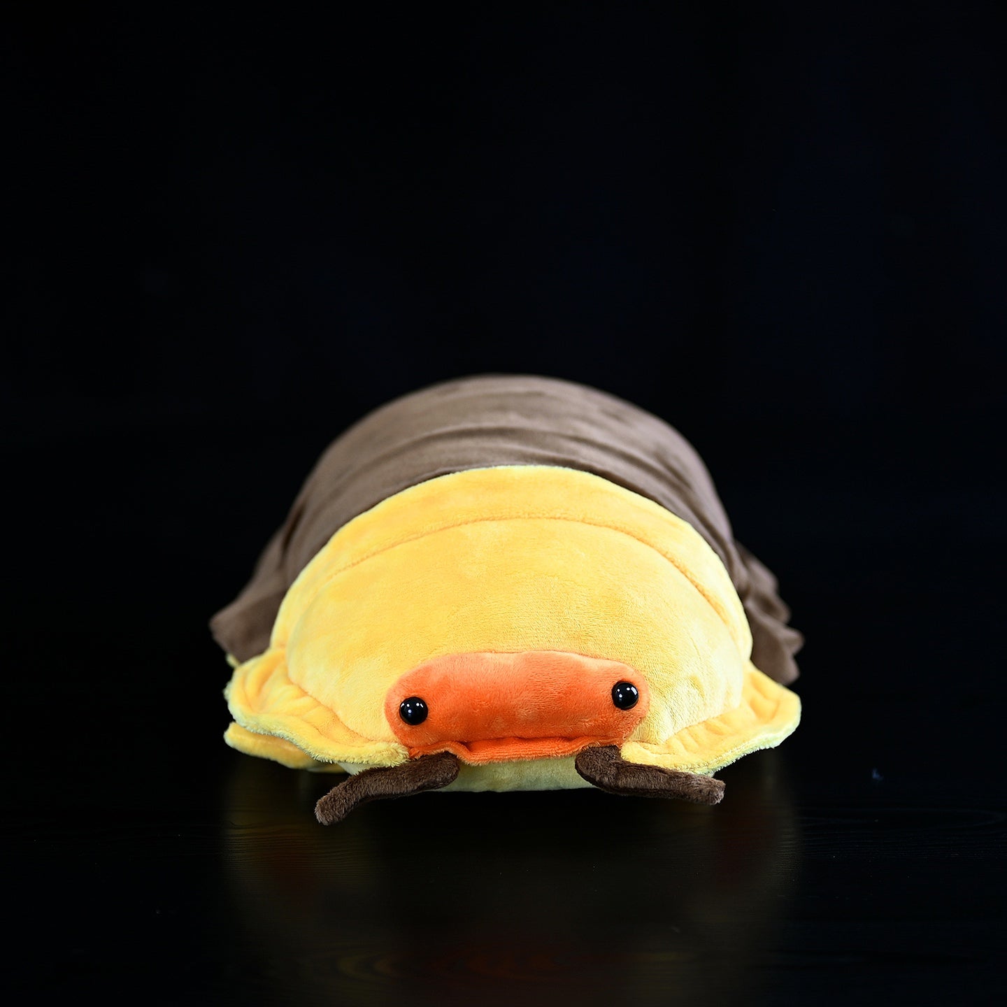 Front view of Rubber Ducky Isopod Plush Toy by SoftDaysLab, showcasing its adorable face and vibrant colors