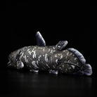 Back-side view of a Latimeria coelacanth plush toy, highlighting realistic fins and unique ancient fish patterns