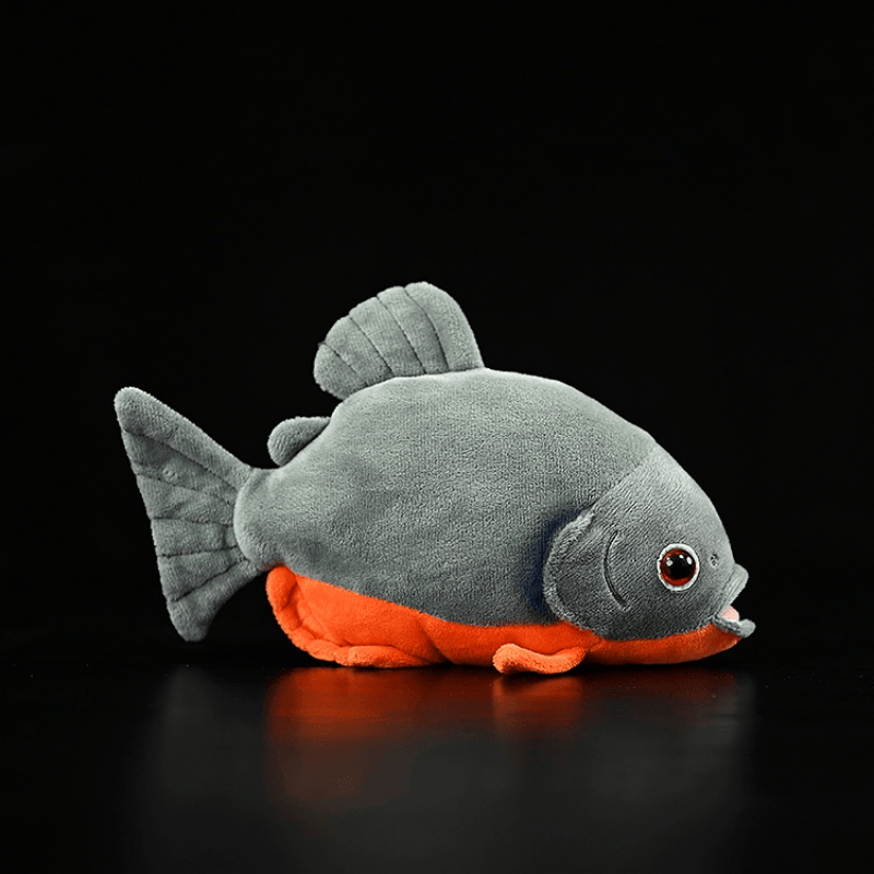 Side angle of Red-Bellied Piranha plush toy, detailed fins and soft stuffed design, perfect for fish lovers
