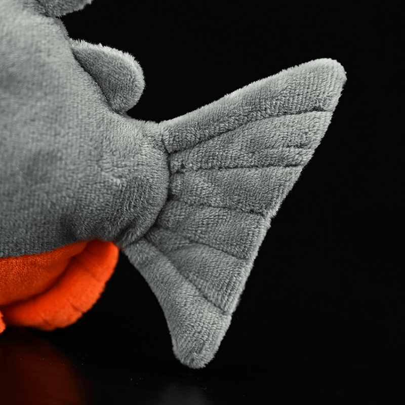 Tail detail of Red-Bellied Piranha plush toy, realistic stuffed fish design with soft fabric and textured fins