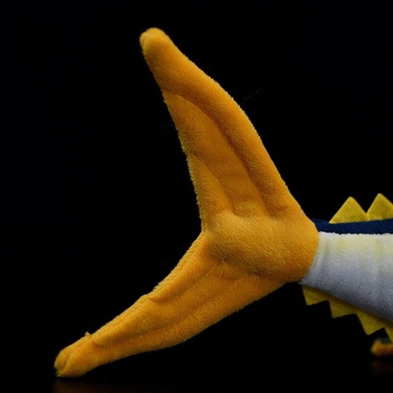 Tail detail of Yellowfin Tuna plush toy, featuring soft fabric and realistic curved fin design